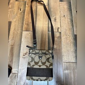 Signature Coach crossbody purse